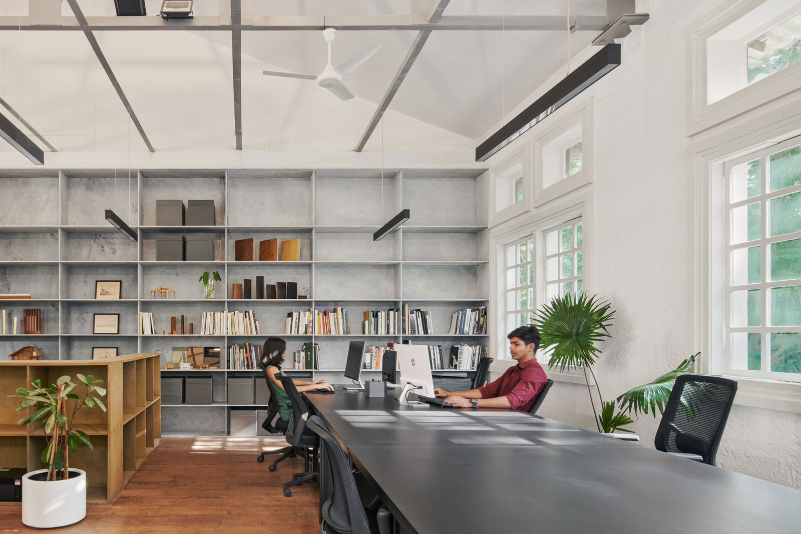 the industrial character of the textile mill turned into an architecture studio
