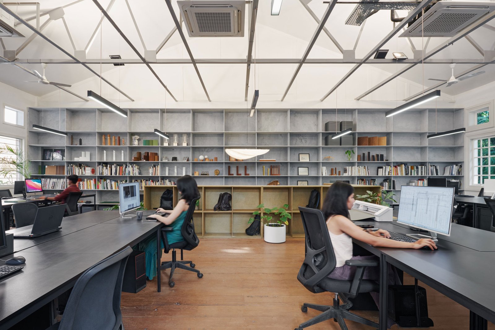 the industrial character of the textile mill turned into an architecture studio