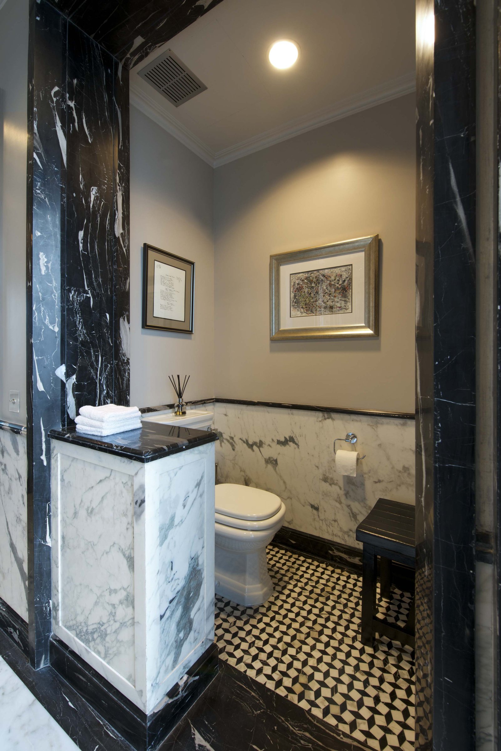 His Bathroom Toilet in Marble at duplex apartment interior design mumbai india