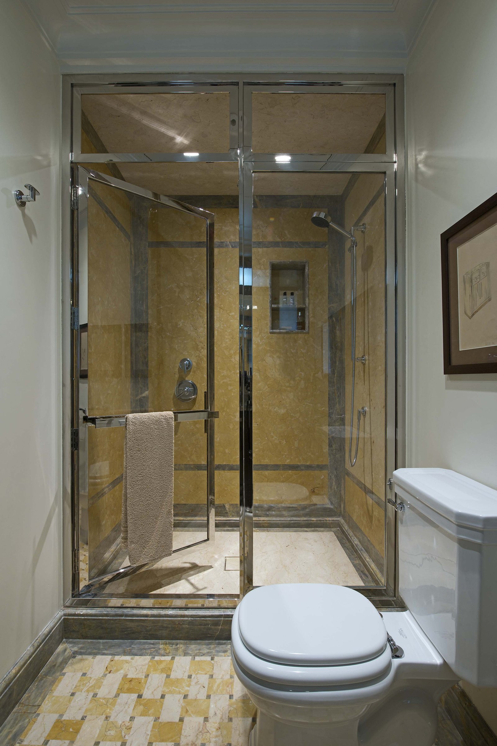 Bathroom in Marble and Glass Door at duplex apartment interior design mumbai india