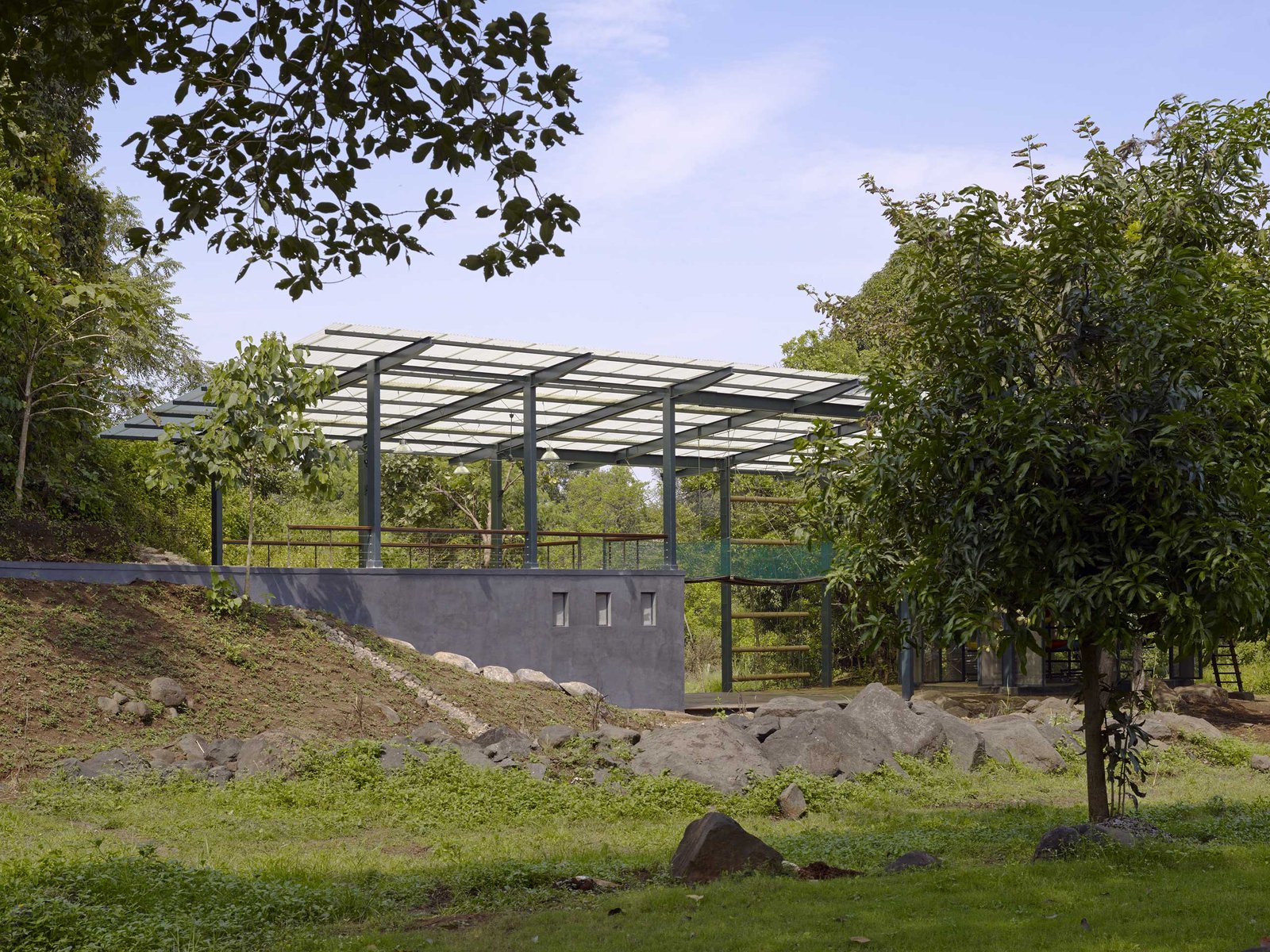 view of pavilion from the field magic bus learning pavilion Karjat india