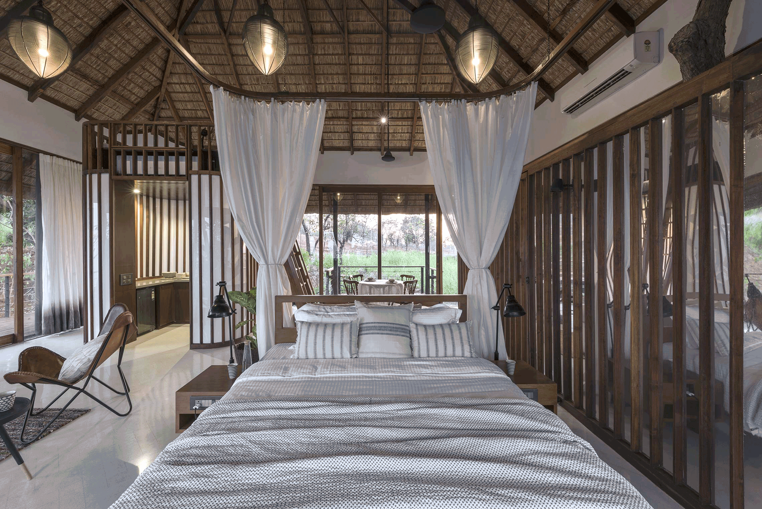 master bedroom four poster bed at tala treehouse villa alibaug india