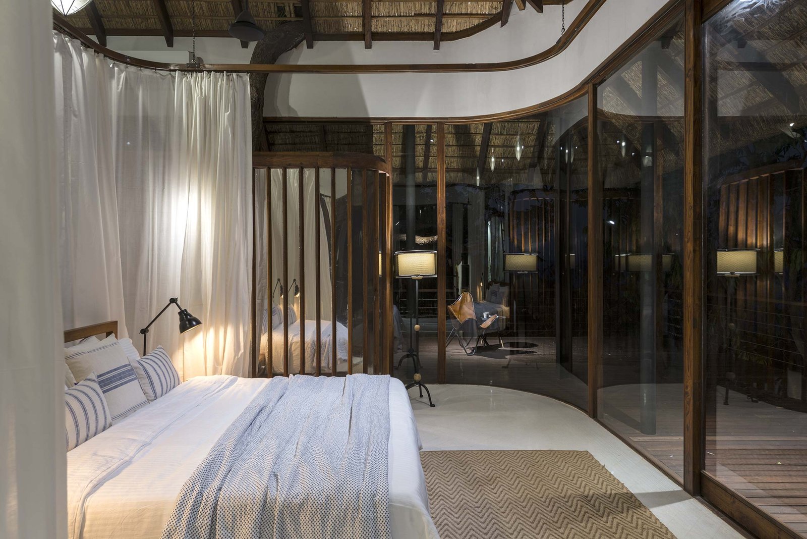 reflective glass Tala Treehouse Villa Bedroom at Night